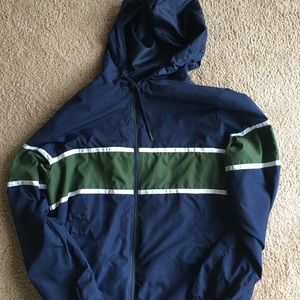 striped windbreaker